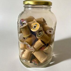 Jar Of Vintage Wooden Thread Spools